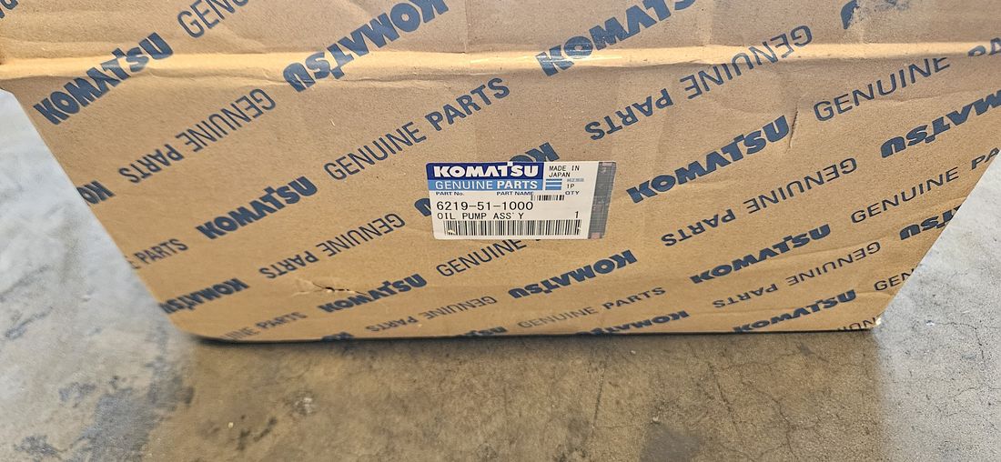 Genuine Komatsu oil pump assembly 6219-51-1000 in original box